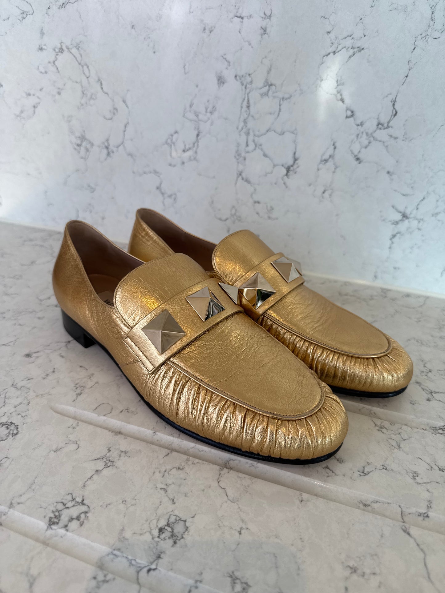 Valentino Garavani Roman Stud Metallic Gold Leather Loafers.